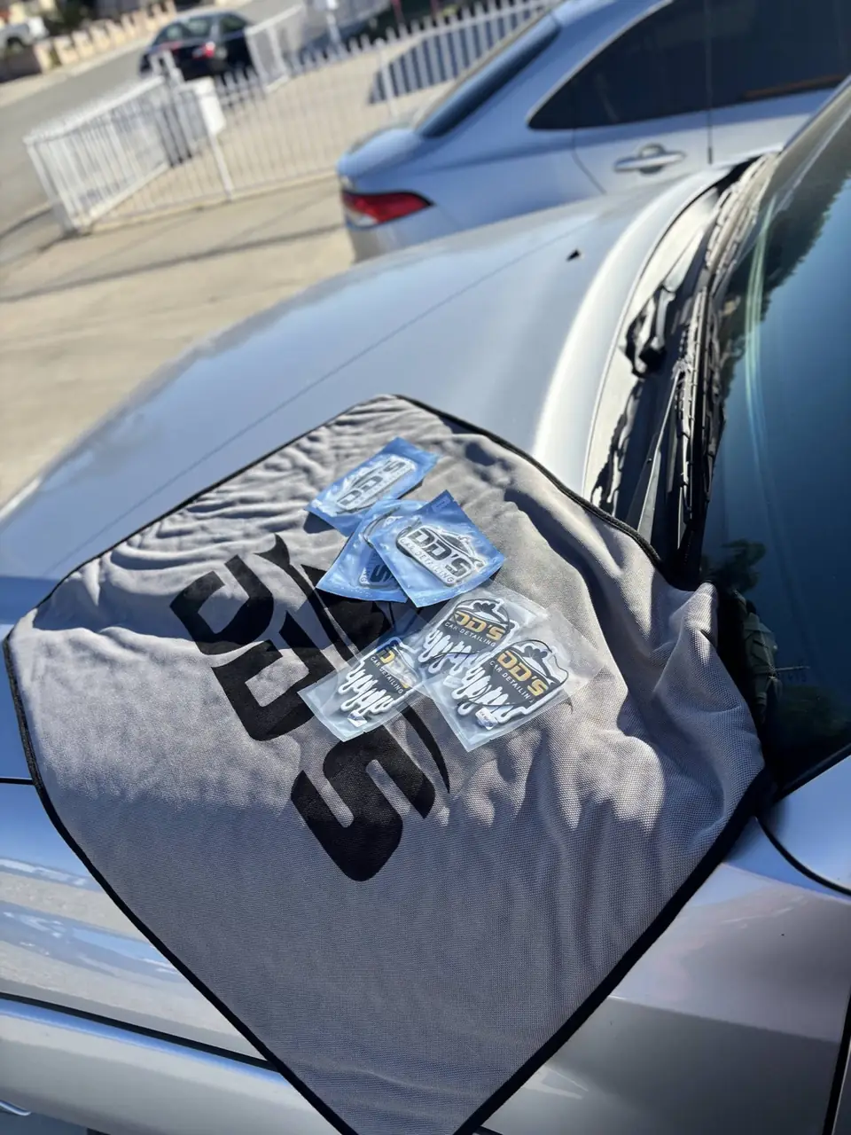 DD's logo air fresheners laid out on a microfiber towel