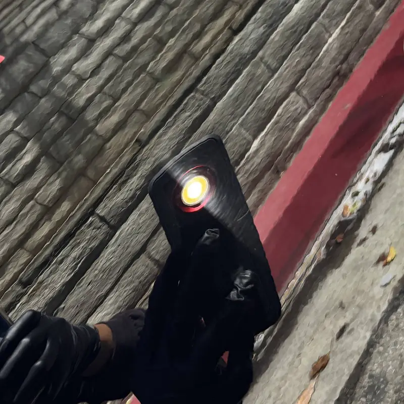 Swirl-finder light revealing paint condition during inspection