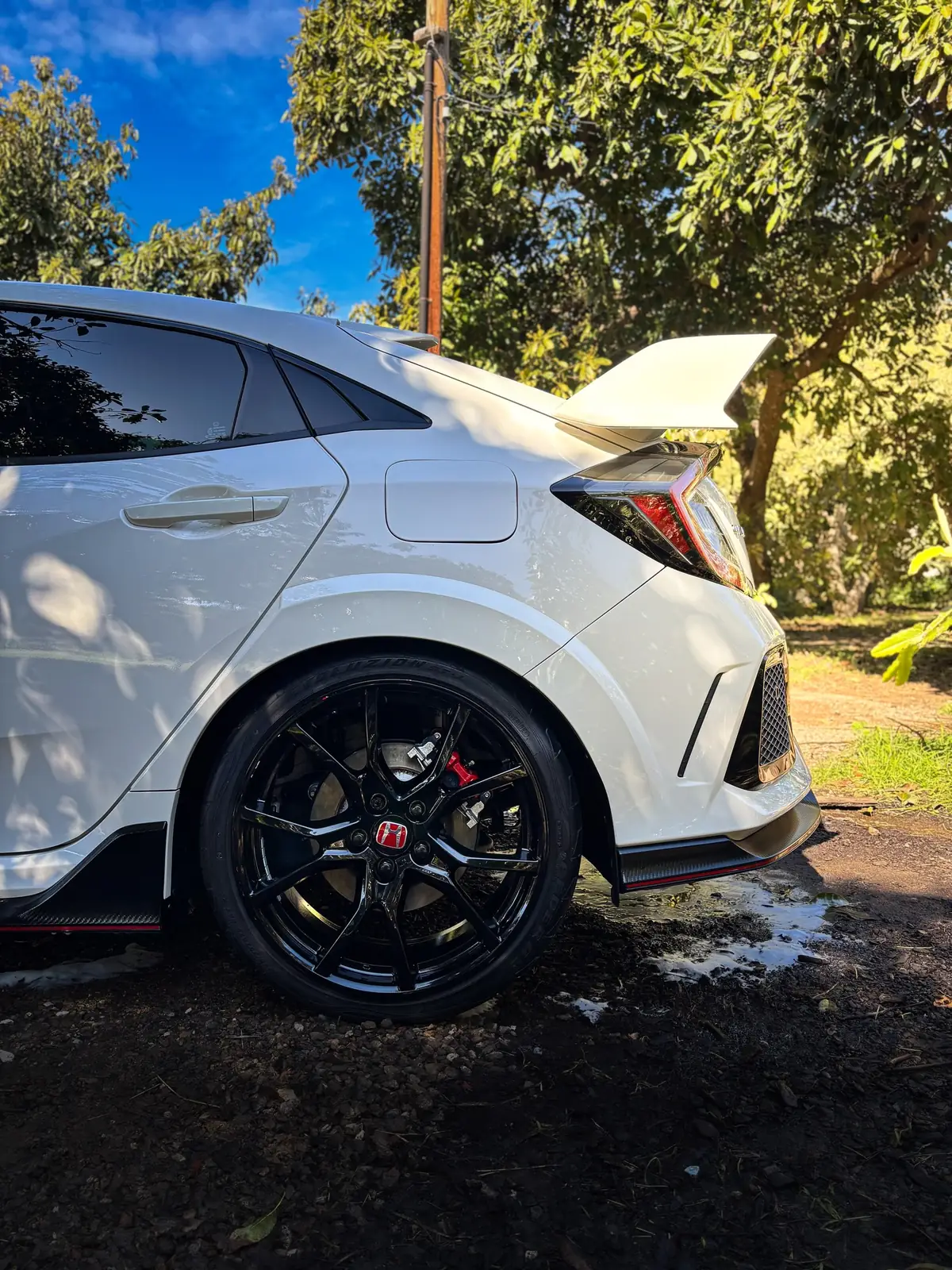 A white Honda Civic Type R gleaming after a full detail