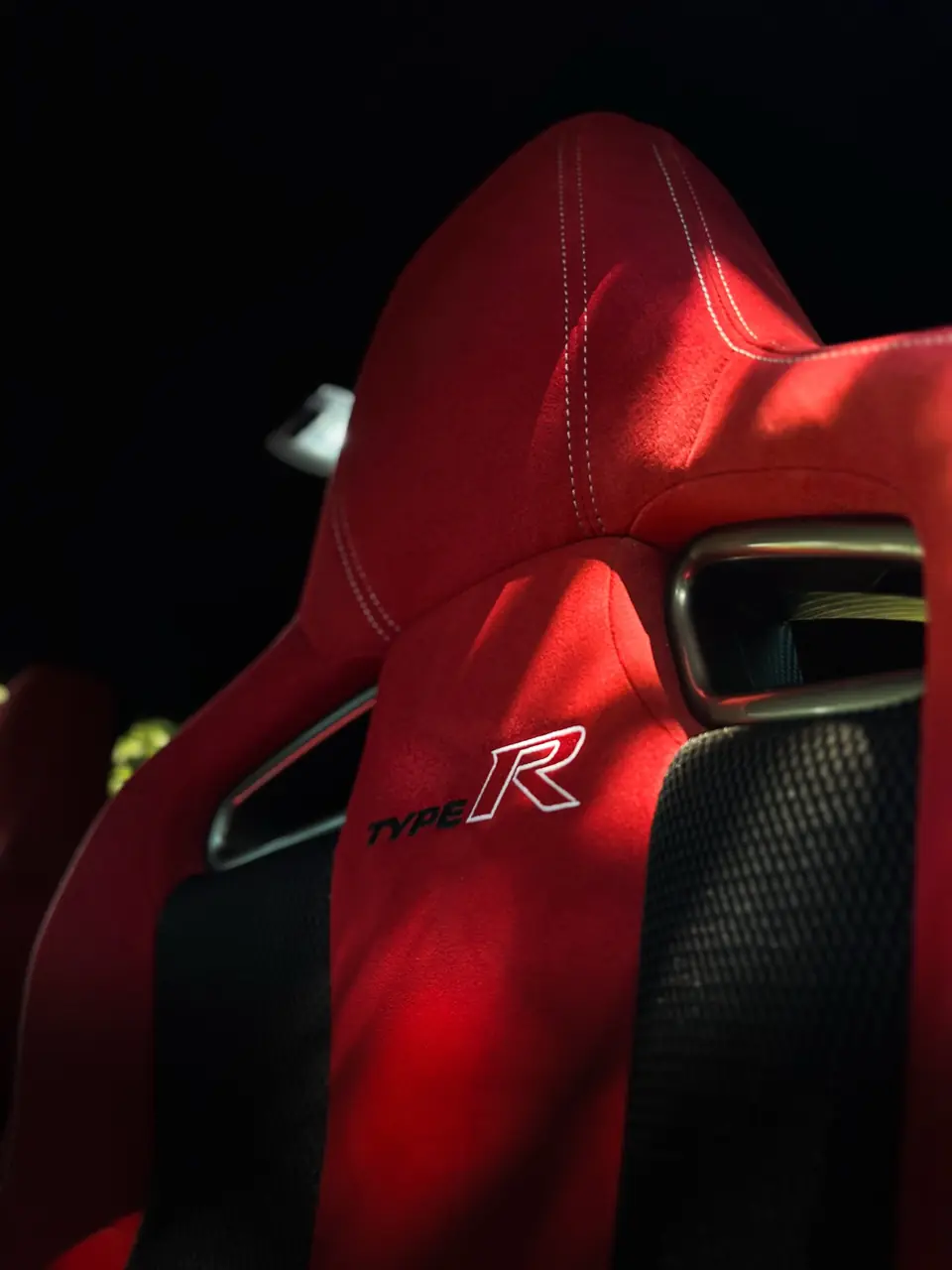 Detailed red bucket seat inside a Honda Civic Type R