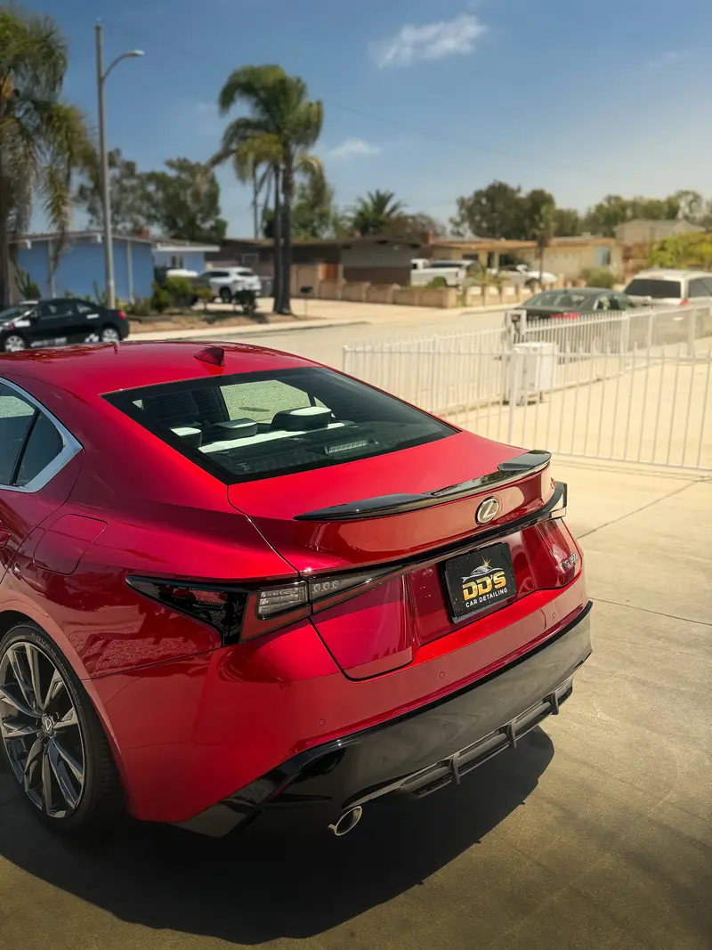 Deep gloss on the rear of a ceramic-coated red Lexus IS